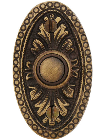 Oval Beaded Solid-Brass Doorbell Button in Antique Brass.